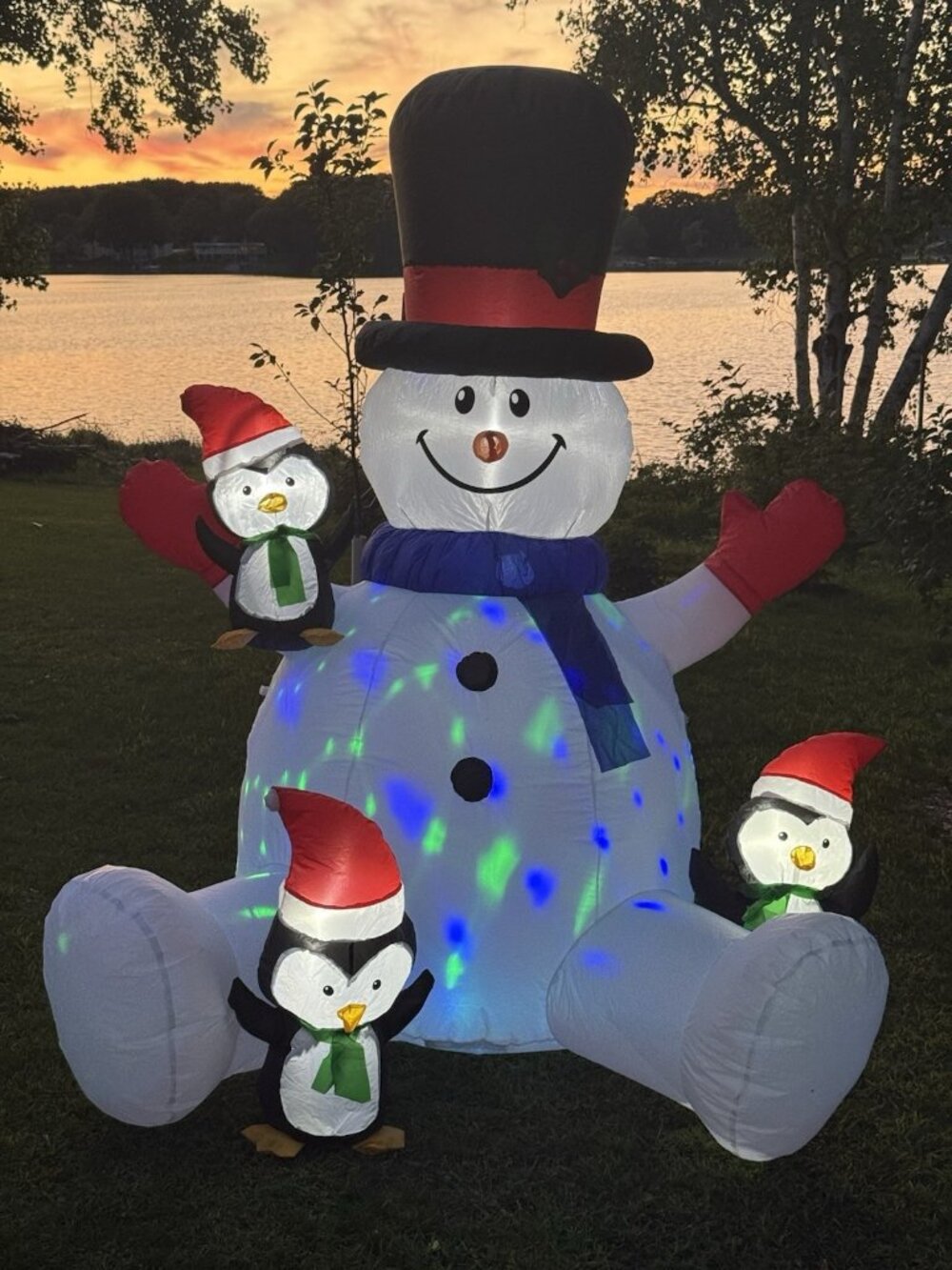 7 Ft Inflatable Snowman & Three Penguins With Rotating Multi-color LED Lights